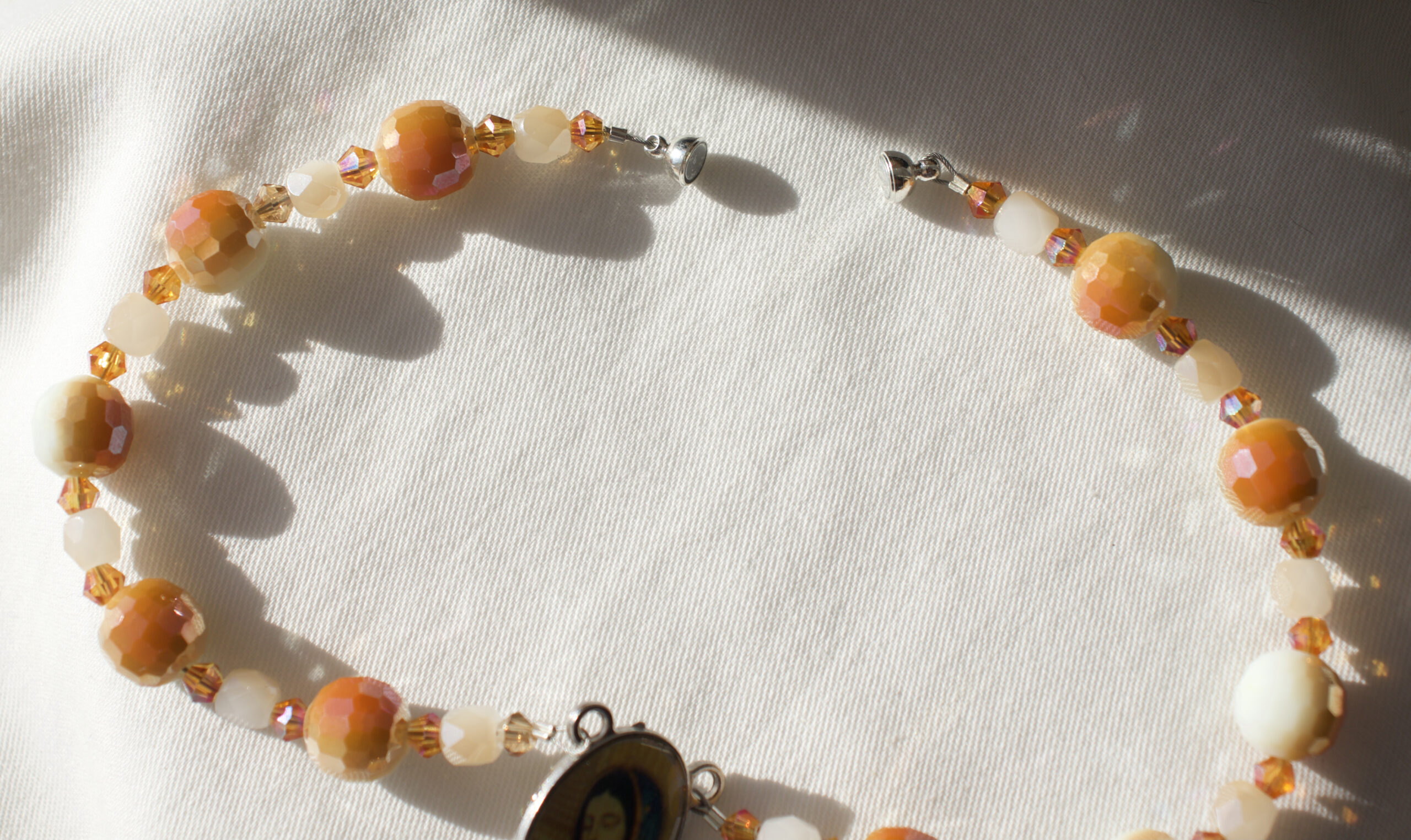 Orange and White Bead Car Rosary - Image 4